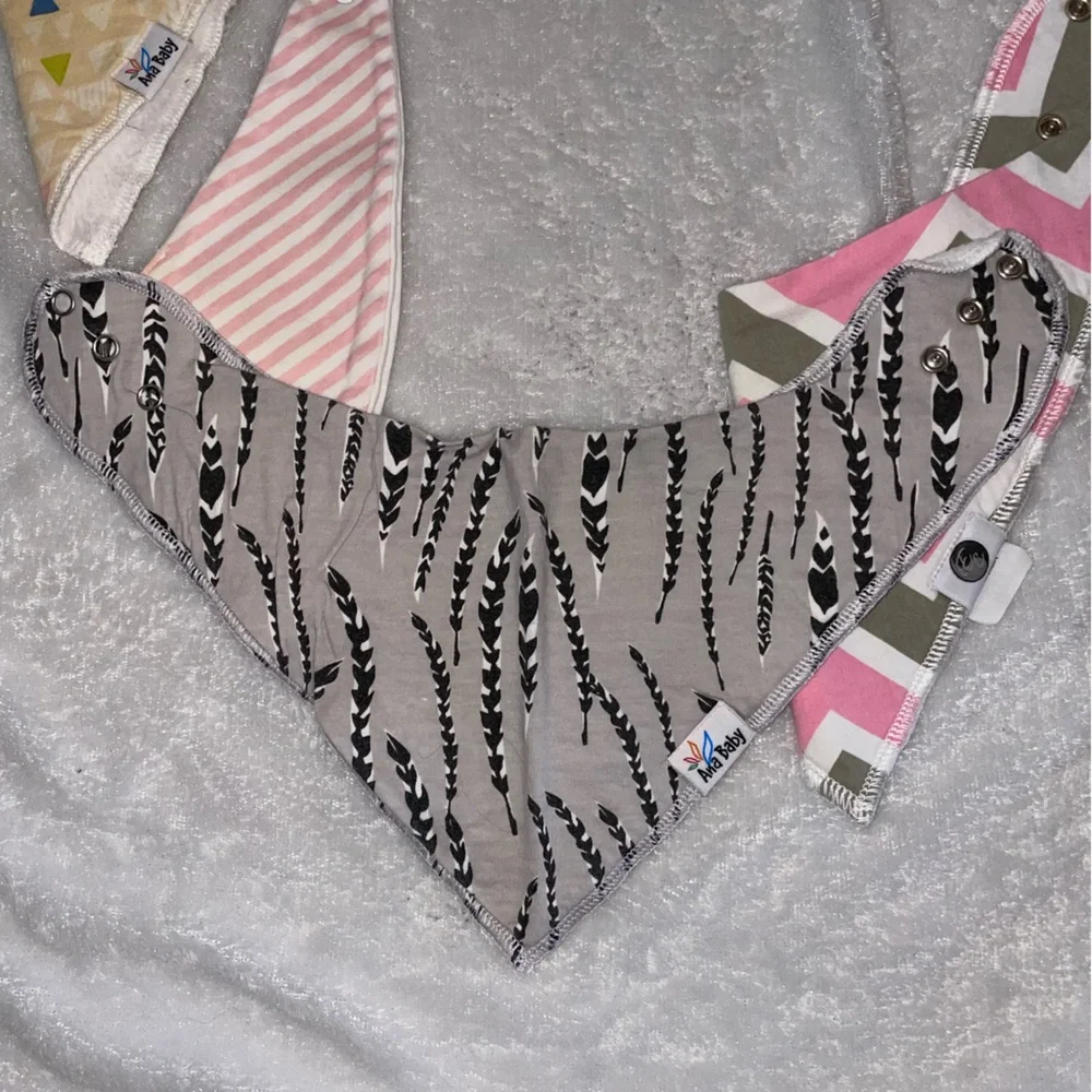 Four bandana style bibs